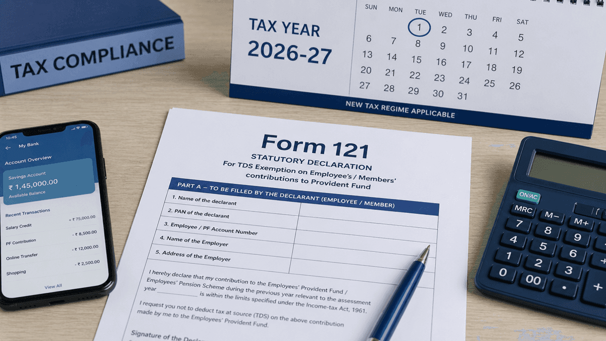 A close-up view of a document titled Form 121 placed on a desk beside a calculator and a calendar showing tax year dates.